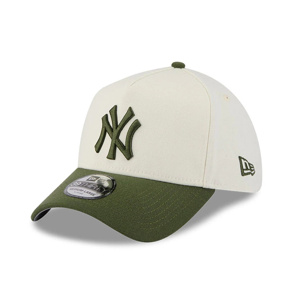 New York Yankees MLB Chrome Cream New Era 39THIRTY A-Frame Stretch Fit Cap, three-quarter view showing the dark green NY logo in raised embroidery on the front panel, with a matching green curved visor and a New Era flag logo on the left side.