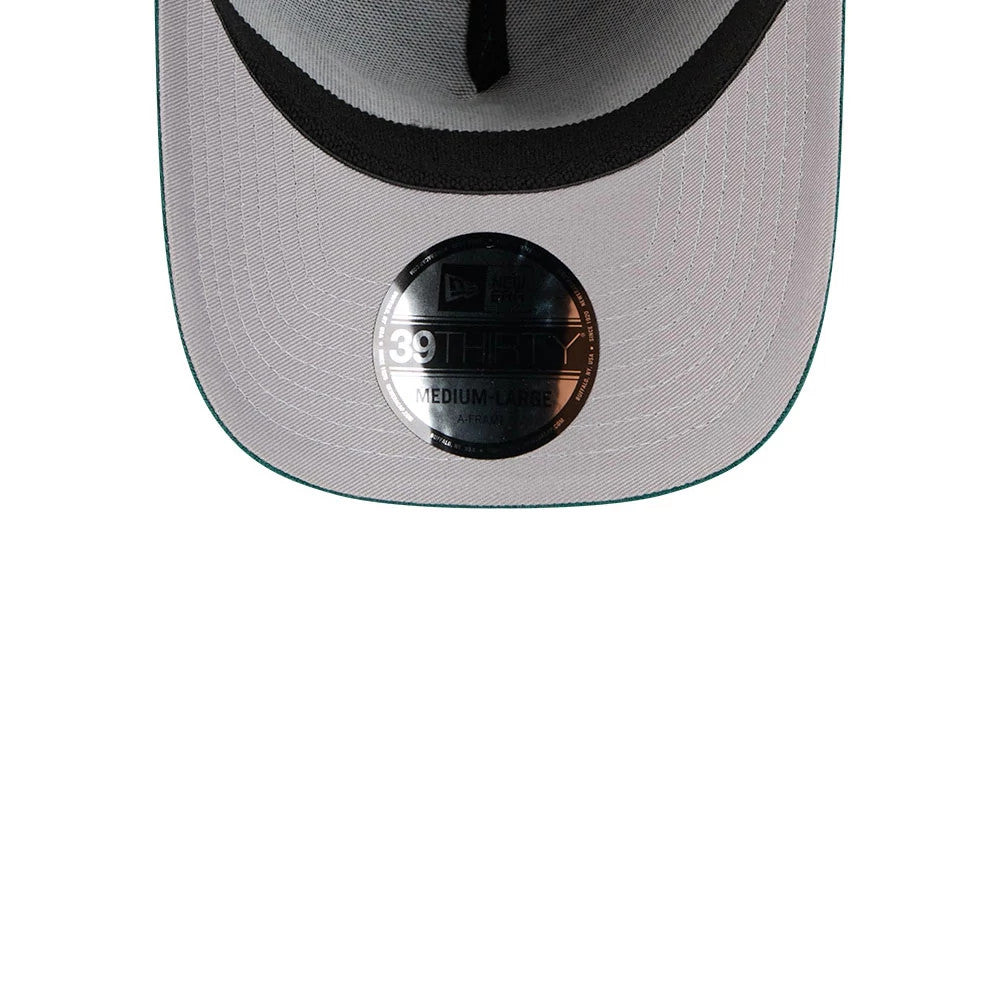 Philadelphia Eagles NFL Suede Dark Green New Era 39THIRTY A-Frame Stretch Fit Cap, inside view showing a grey undervisor with a 39THIRTY size sticker on the centre and black sweatband revealing interior taping.