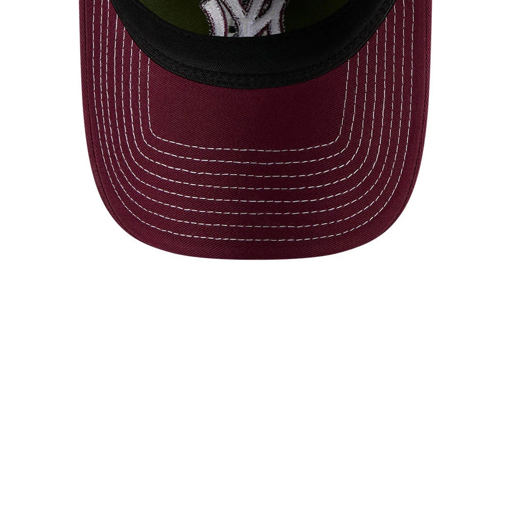 New York Yankees MLB 2Tone Dark Green New Era 9TWENTY Adjustable Cap, inside view showing the black sweatband, dark green undervisor, and size tag next to the white embroidered NY logo through the crown.