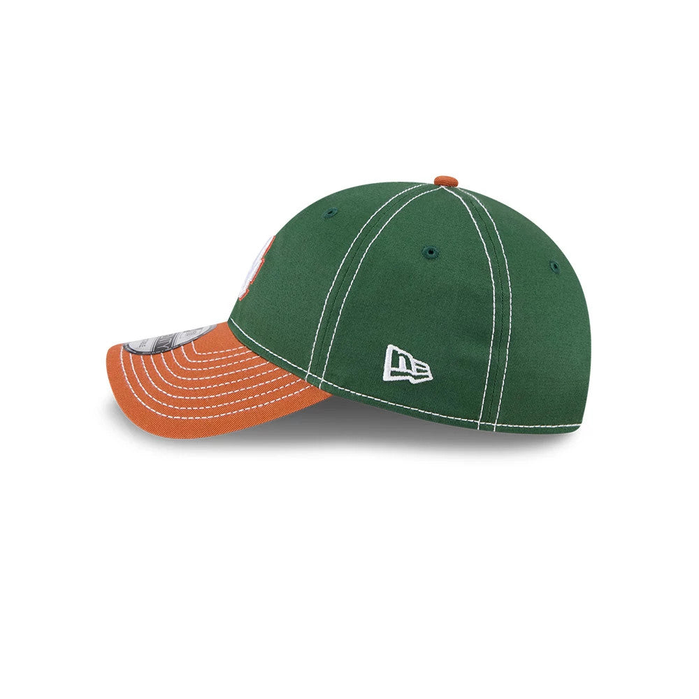 LA Dodgers MLB 2Tone Dark Green New Era 9TWENTY Adjustable Cap, side view showing the white New Era flag logo on the dark green crown, with an orange curved visor and white stitching throughout.