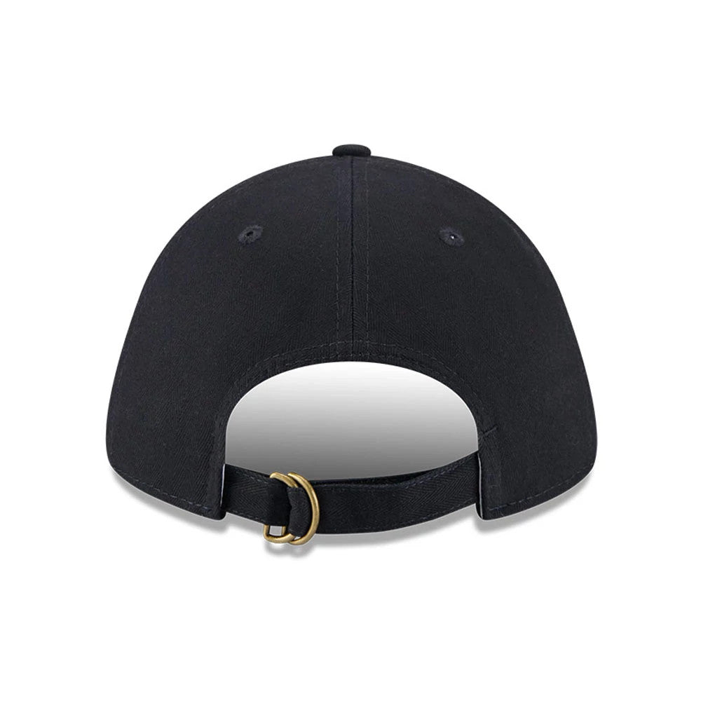 New York Yankees MLB Herringbone Navy New Era 9TWENTY Adjustable Cap, rear view showing the unstructured navy crown with a curved visor, navy fabric strap with a buckle, and small embroidered eyelets for ventilation.