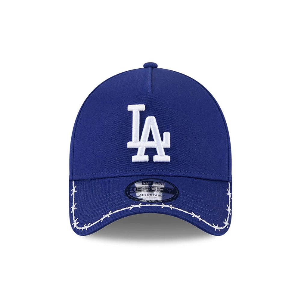 LA Dodgers MLB Barb Visor Dark Blue New Era 9FORTY A-Frame Adjustable Cap, front view showing the white embroidered LA logo on the structured dark blue crown, with distinct barb-like stitching on the curved visor and a 9FORTY size sticker.