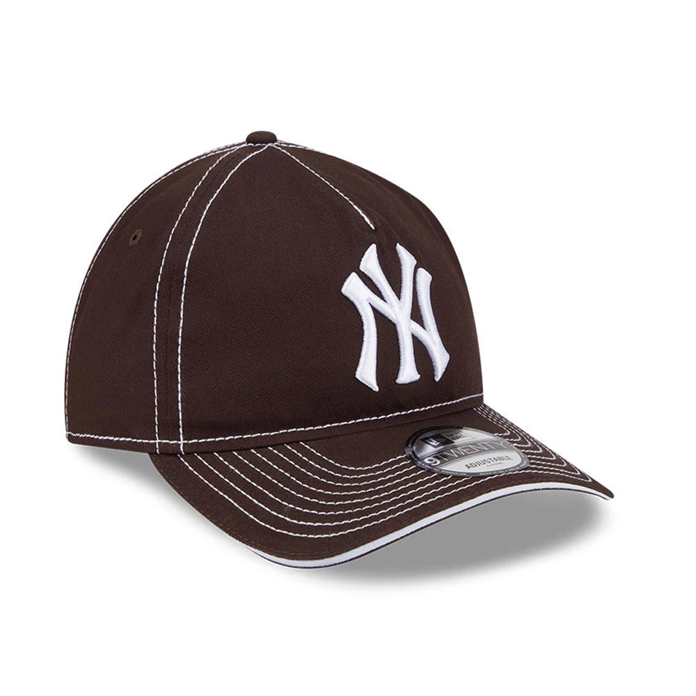 New York Yankees MLB Contrast Dark Brown New Era 9TWENTY A-Frame Adjustable Cap, three-quarter view showing white raised embroidery NY logo on the front panel, dark brown visor with contrasting white stitching and 9TWENTY size sticker.