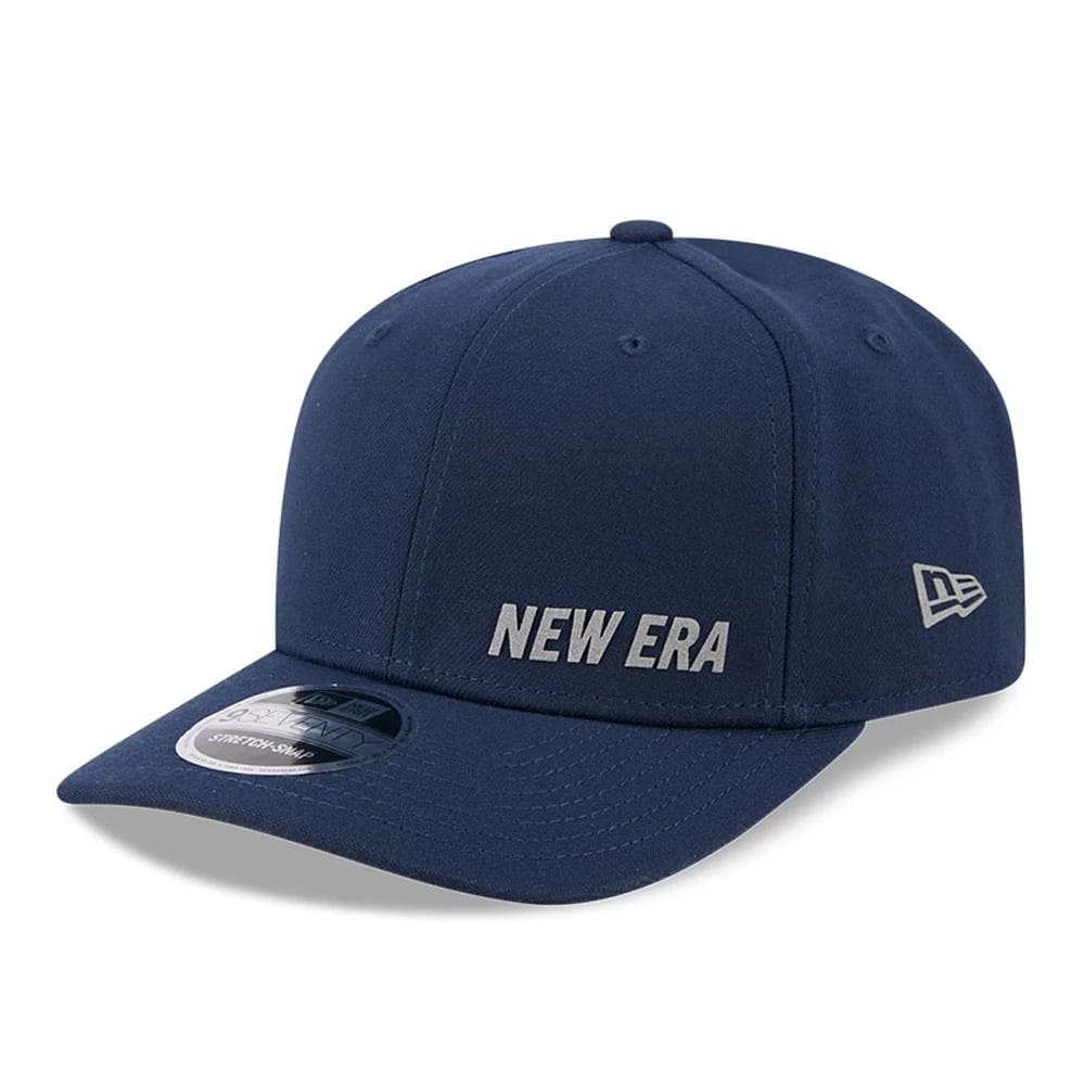 Pictured is this New Era Flawless 9SEVENTY Stretch Snap cap in dark blue. 1
