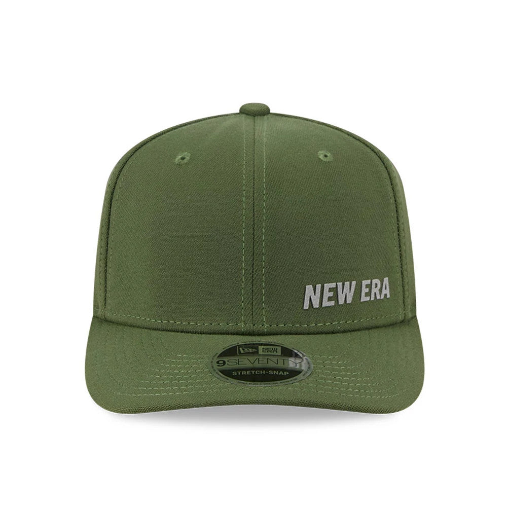 New Era Flawless Dark Green 9SEVENTY Stretch Snap Adjustable Cap, front view showing New Era white embroidered logo on the right front panel, a structured crown with eyelets, a curved visor, and a 9SEVENTY size sticker on the visor.