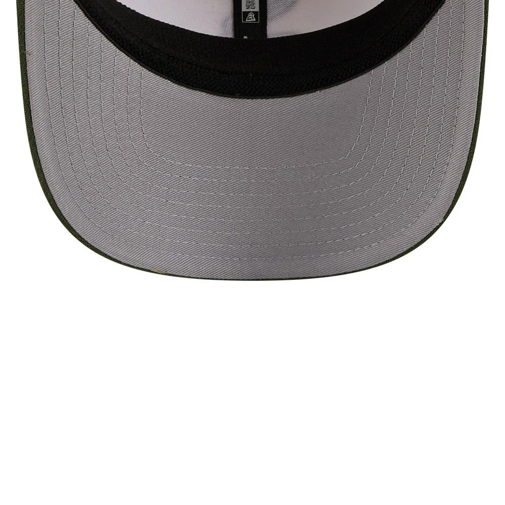 White Sox MLB Rifle Green New Era 9SEVENTY Stretch Snap Adjustable Cap, inside view showing the grey undervisor, black internal sweatband, and branded taping running across the structured interior.