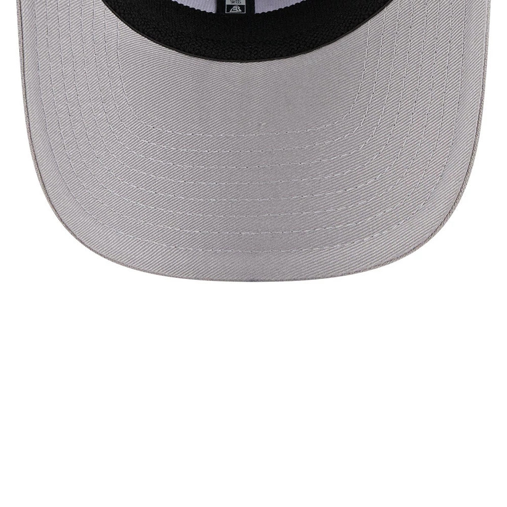 Chicago Bulls NBA Script Grey New Era 9SEVENTY Stretch Snap Adjustable Cap, inside view showing the grey undervisor and black sweatband, with the New Era logo on the taping along the interior.