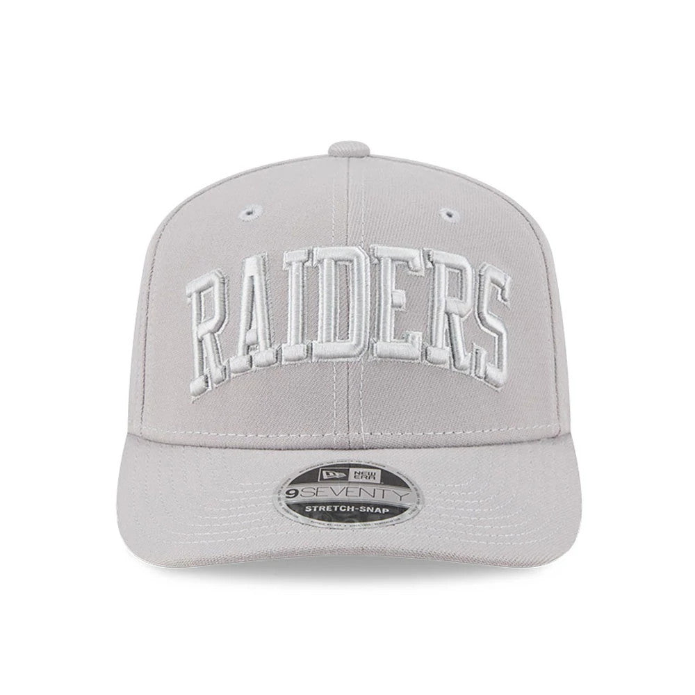 Las Vegas Raiders NFL Script Grey New Era 9SEVENTY Stretch Snap Adjustable Cap, front view showing raised white embroidered RAIDERS lettering on the structured grey crown with a grey curved visor and 9SEVENTY size sticker.