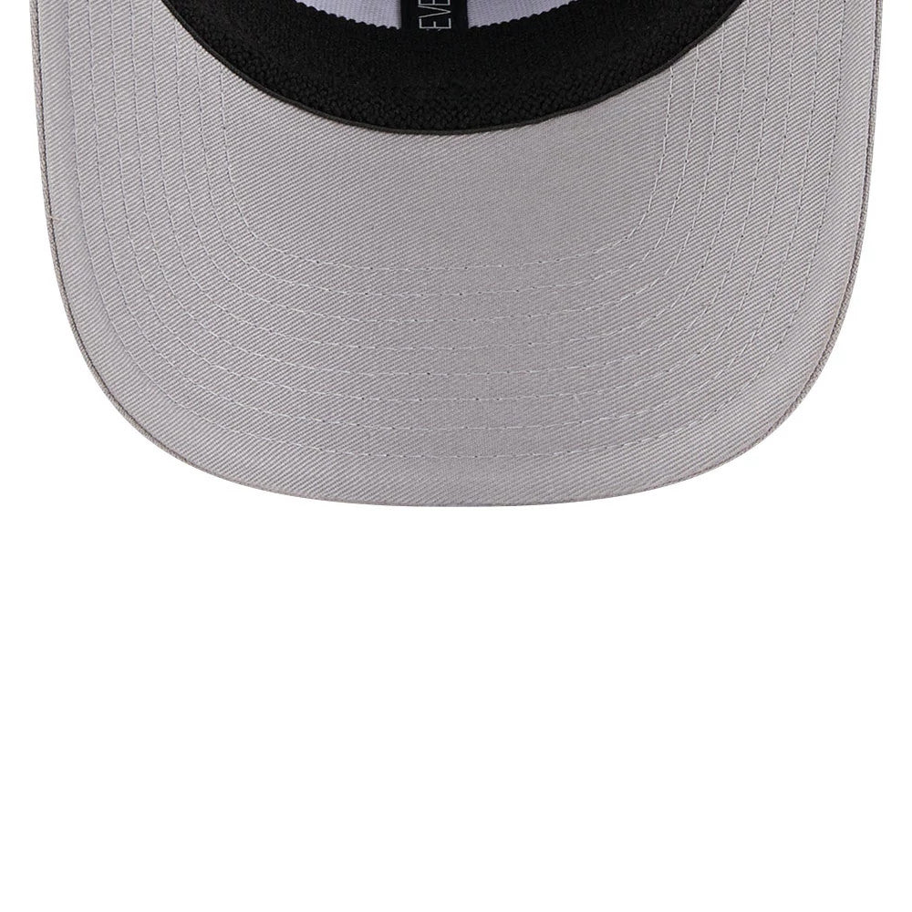 Las Vegas Raiders NFL Script Grey New Era 9SEVENTY Stretch Snap Adjustable Cap, inside view showing the black sweatband, grey undervisor, and white taping with a New Era logo on the underside of the visor.