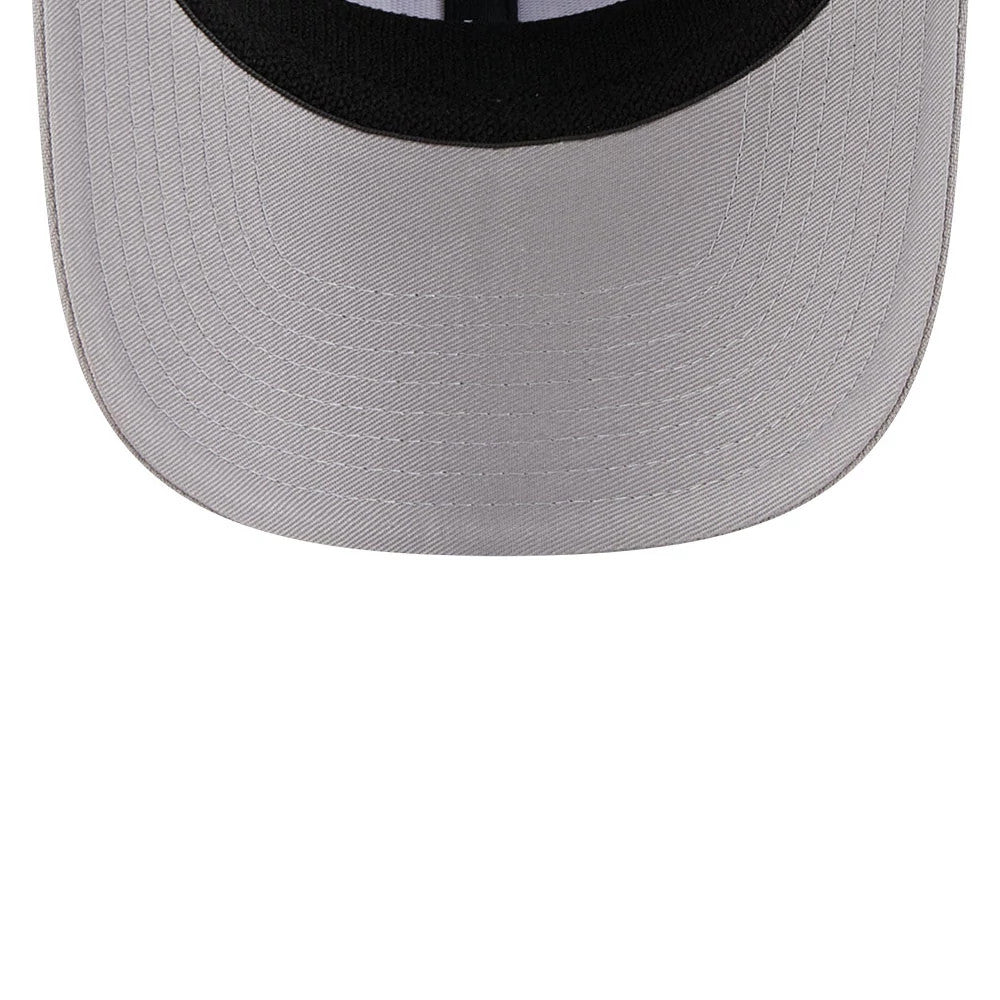 New York Yankees MLB Script Grey New Era 9SEVENTY Stretch Snap Adjustable Cap, inside view showing the black sweatband, grey undervisor, and inner taping with the structured curve of the visor.