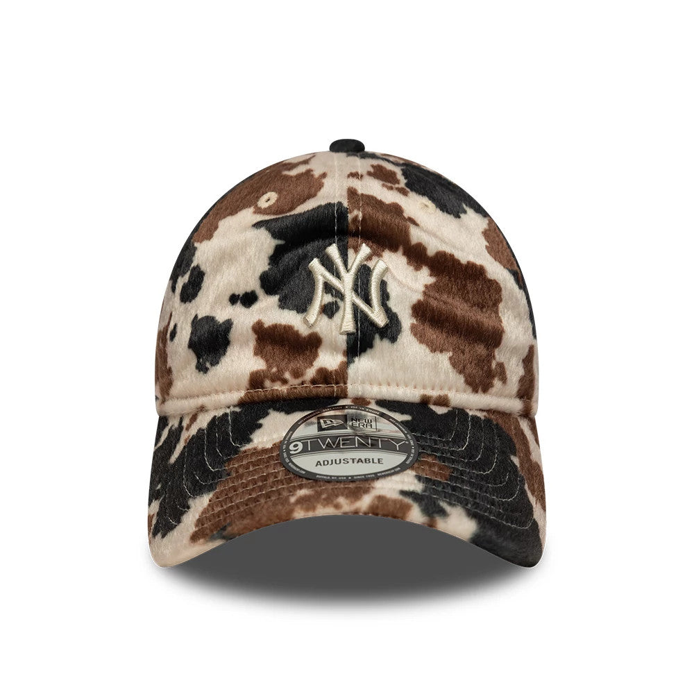 New York Yankees Animal Print Beige New Era 9TWENTY Adjustable Cap, front view showing the beige and brown animal print fabric with raised beige NY logo on the front panel and a 9TWENTY size sticker on the curved visor.
