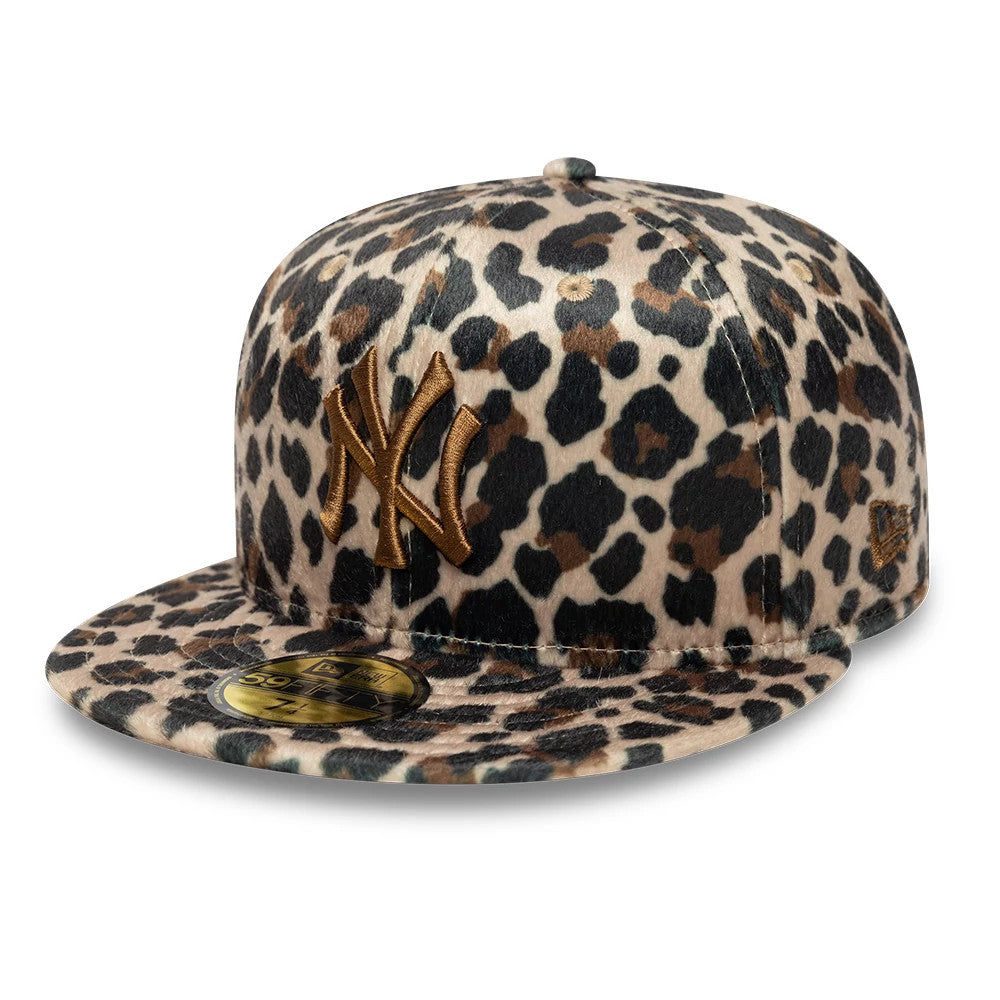 New York Yankees Animal Print Leopard Black New Era 59FIFTY Fitted Cap, three-quarter view with a raised gold NY logo embroidered on the front panel, leopard print across the crown and visor, and a gold 59FIFTY size sticker on the flat visor.
