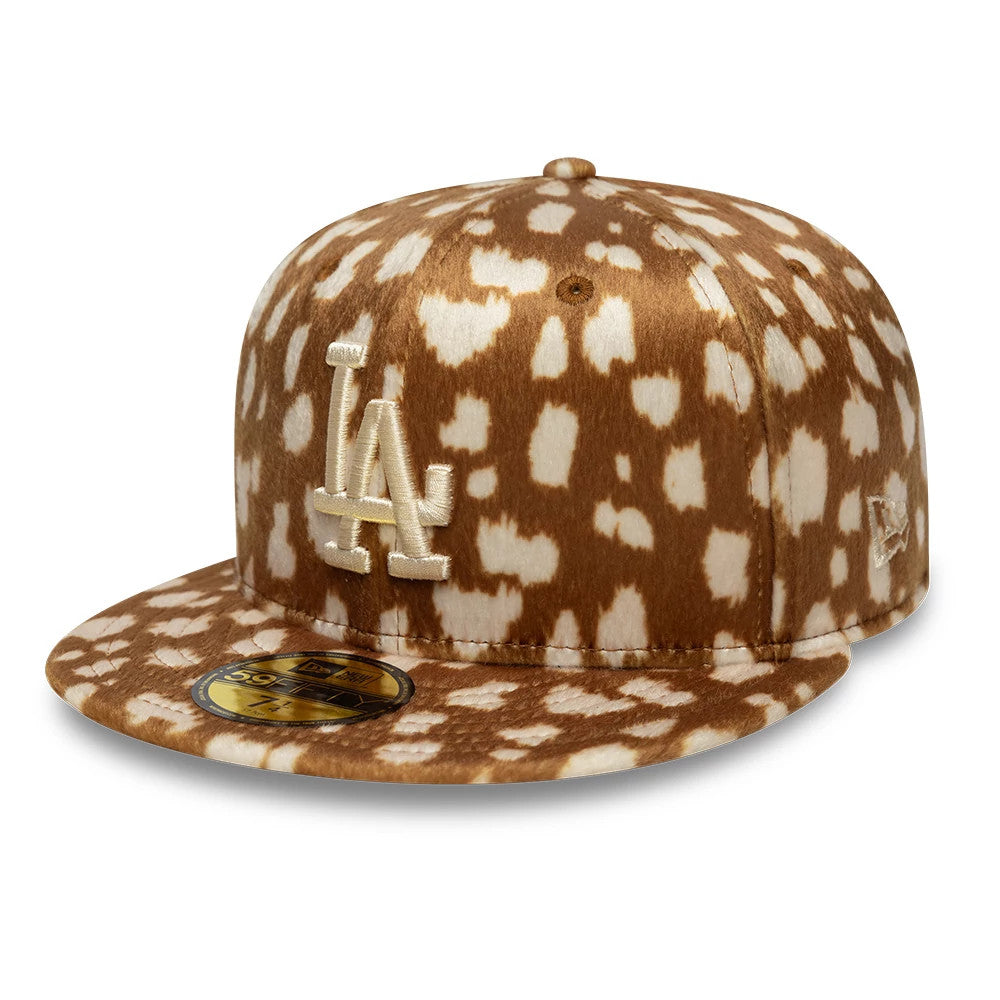 LA Dodgers Animal Print Dark Beige New Era 59FIFTY Fitted Cap, front view showing a raised white embroidered LA logo on the animal print crown and visor, with a gold 59FIFTY size sticker on the flat visor.
