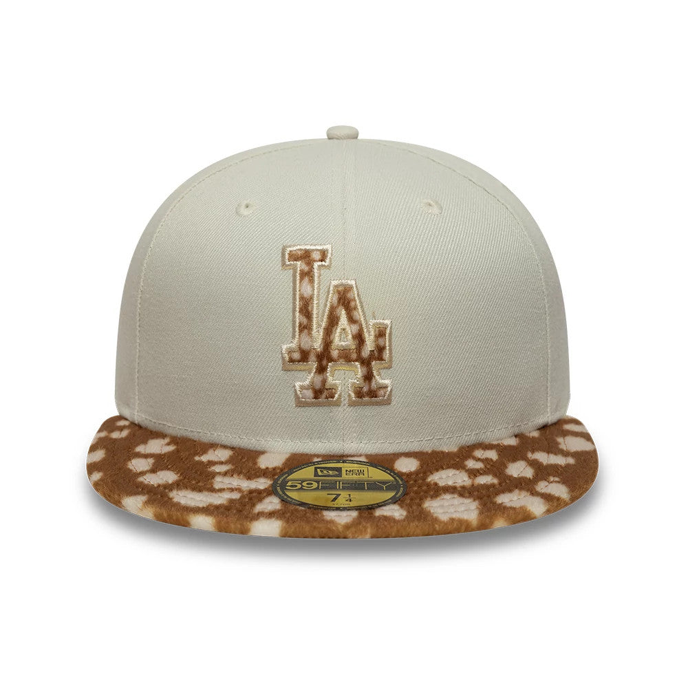 LA Dodgers Animal Print Beige New Era 59FIFTY Fitted Cap, front view with a raised embroidered LA logo in beige on the structured crown and an animal print pattern on the flat visor featuring a gold 59FIFTY size sticker.