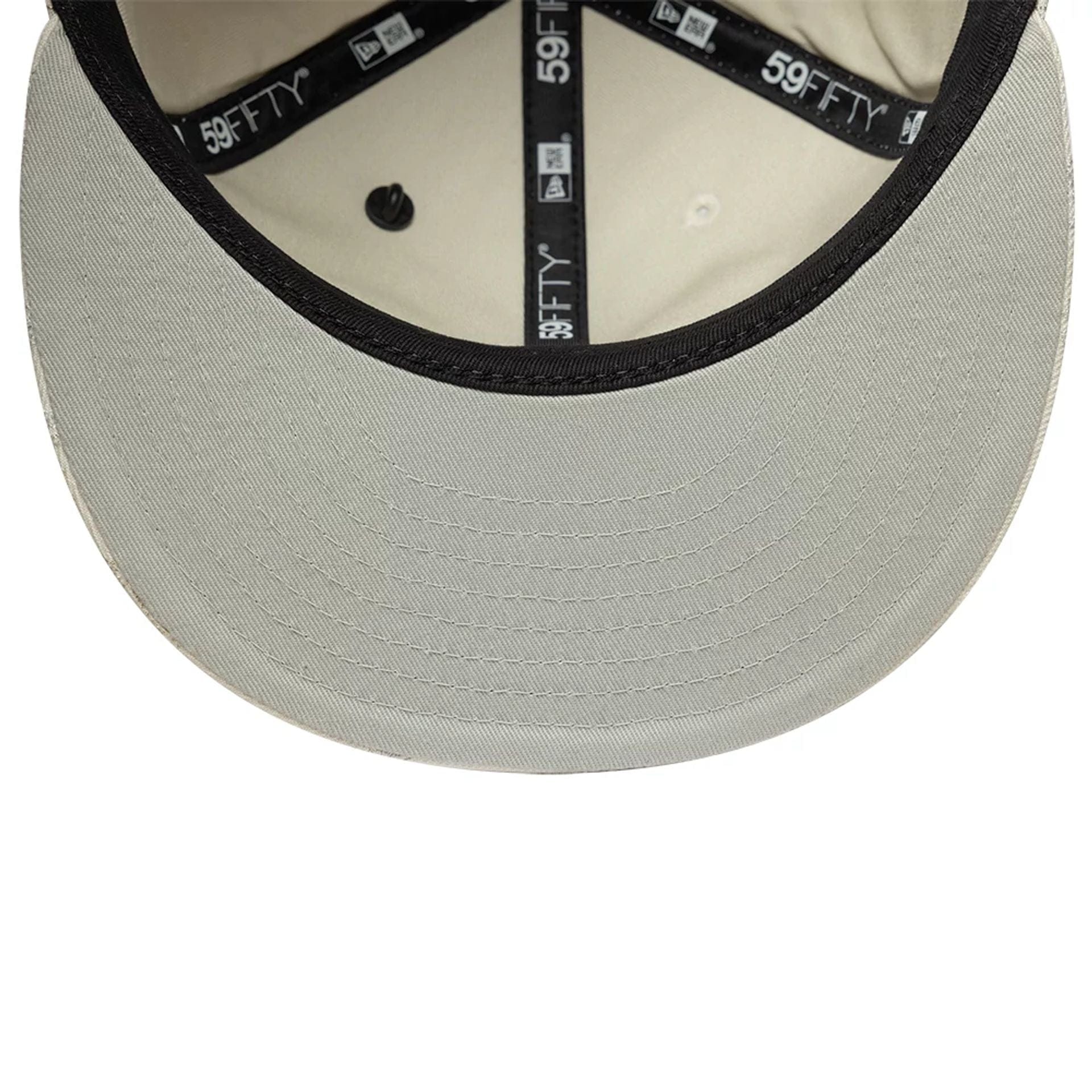 Pictured is this New Era Winter Snowflakes 59FIFTY Fitted cap in light beige. 2