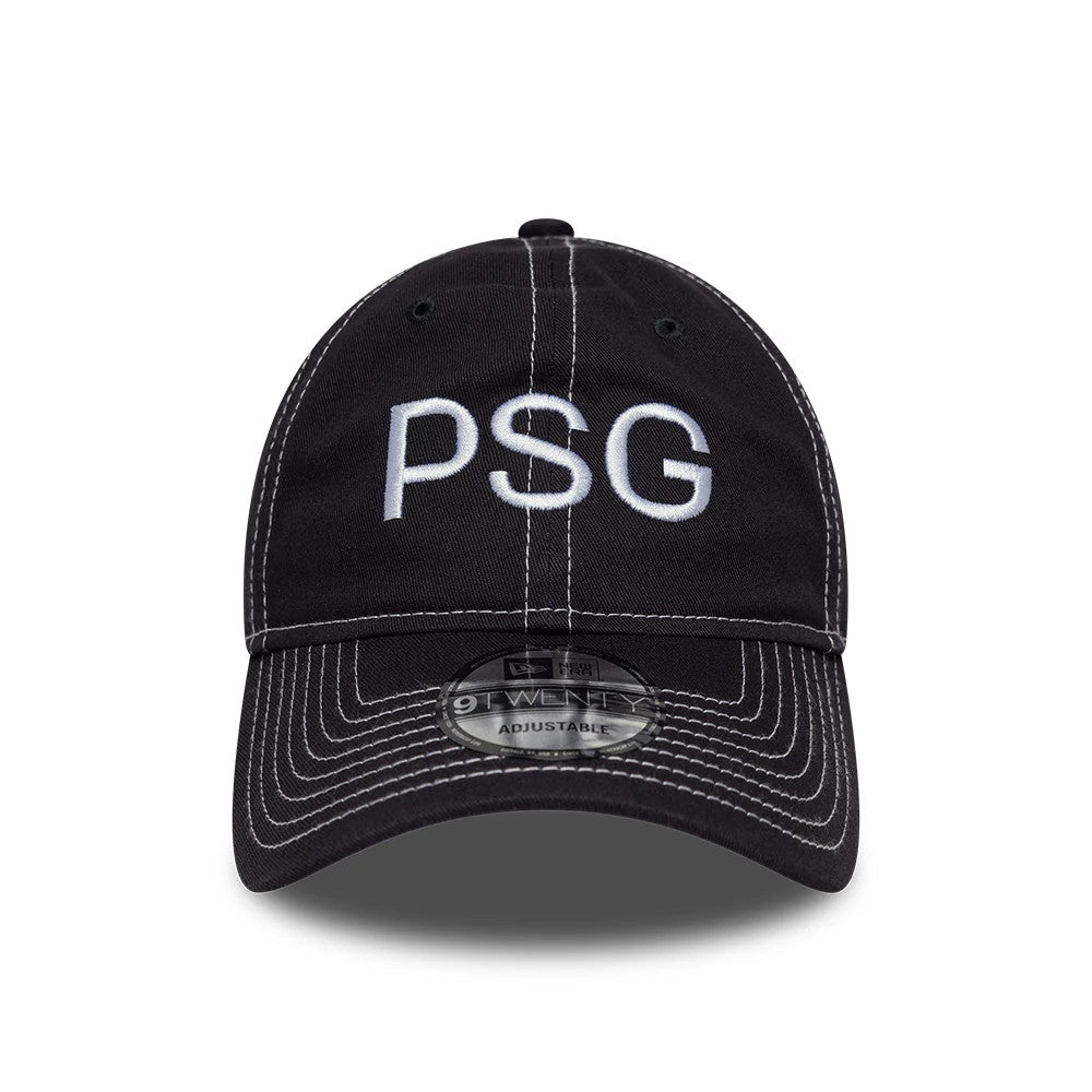 Paris Saint-Germain Pop Stitch Navy New Era 9TWENTY Adjustable Cap, front view showing the white PSG embroidered letters on the structured navy crown, with contrasting white stitching along the curved visor and a 9TWENTY size sticker.