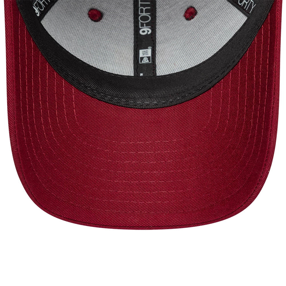 FC Barcelona Youth Core Dark Red New Era 9FORTY Adjustable Cap, inside view showing the black sweatband with New Era branding, red eyelets on the grey fabric lining, and dark red undervisor.