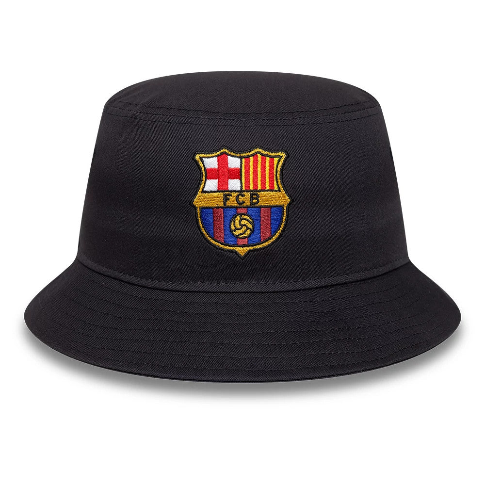 New Era FC Barcelona Core Navy Bucket Hat, front view showing the FC Barcelona crest embroidered on the centre of the navy crown, with a downward sloping visor complementing the classic bucket hat silhouette.