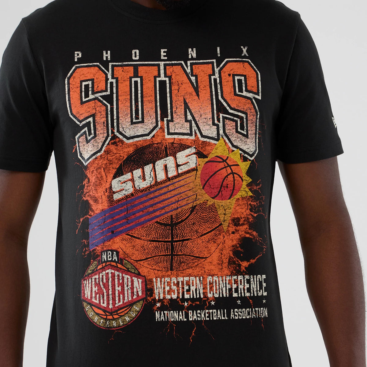 New Era Phoenix Suns NBA Hardwood Classic Black T-Shirt, front view showing distressed SUNS lettering above a graphic with a basketball and sunburst, Phoenix printed below and an embroidered New Era logo on the sleeve.