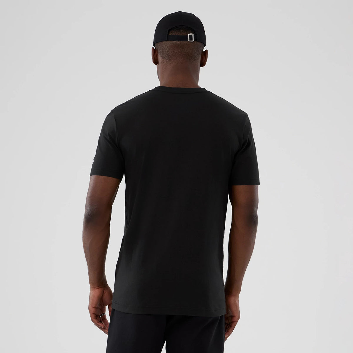 The model is wearing this NBA Hardwood Classic LA Lakers T-Shirt in black. 2