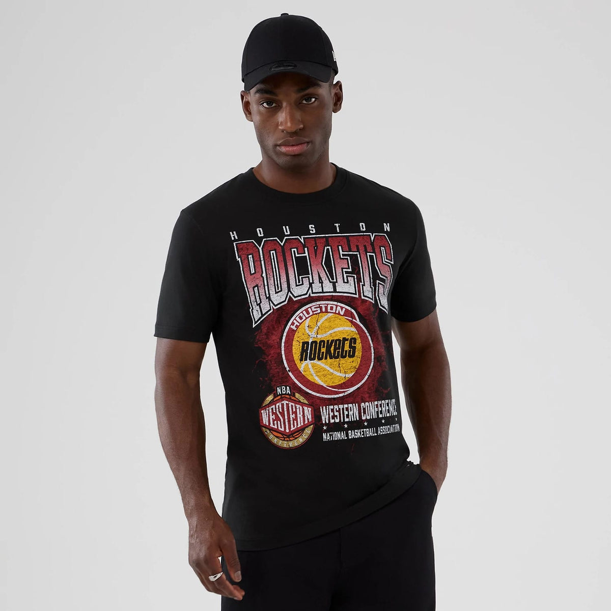The model is wearing this NBA Hardwood Classic Houston Rockets T-Shirt in black. 1