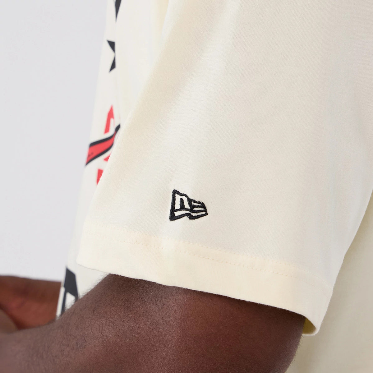 The model is wearing this NBA Hardwood Classic Toronto Raptors T-Shirt in Cream . 4