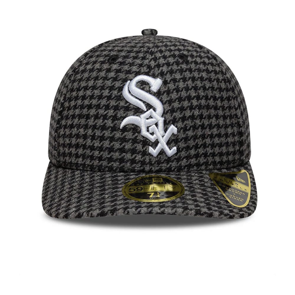 Chicago White Sox MLB Houndstooth Black Low Profile New Era 59FIFTY Fitted Cap, front view showing raised white Sox logo embroidery on the houndstooth crown and visor, with gold 59FIFTY size sticker on the visor.