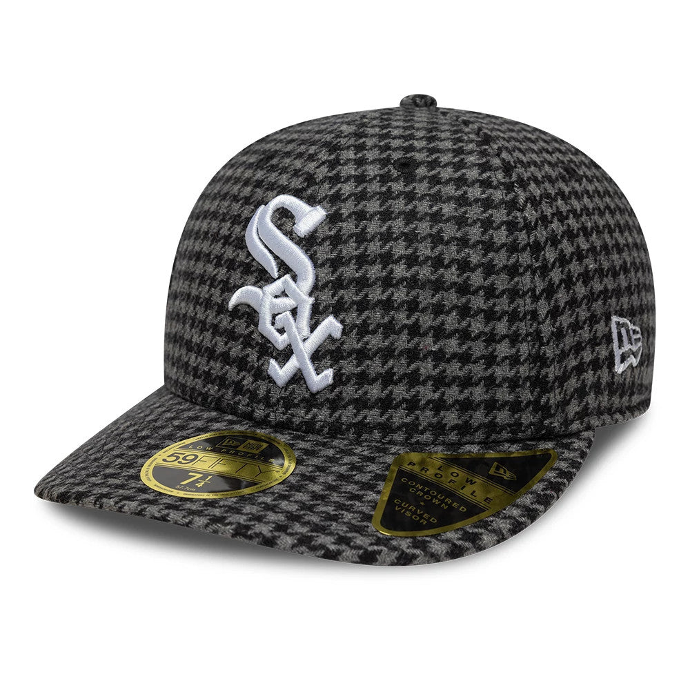 Chicago White Sox MLB Houndstooth Black Low Profile New Era 59FIFTY Fitted Cap, front view showing the raised white embroidered Sox logo on the houndstooth patterned crown, with a gold 59FIFTY size sticker on the curved visor.