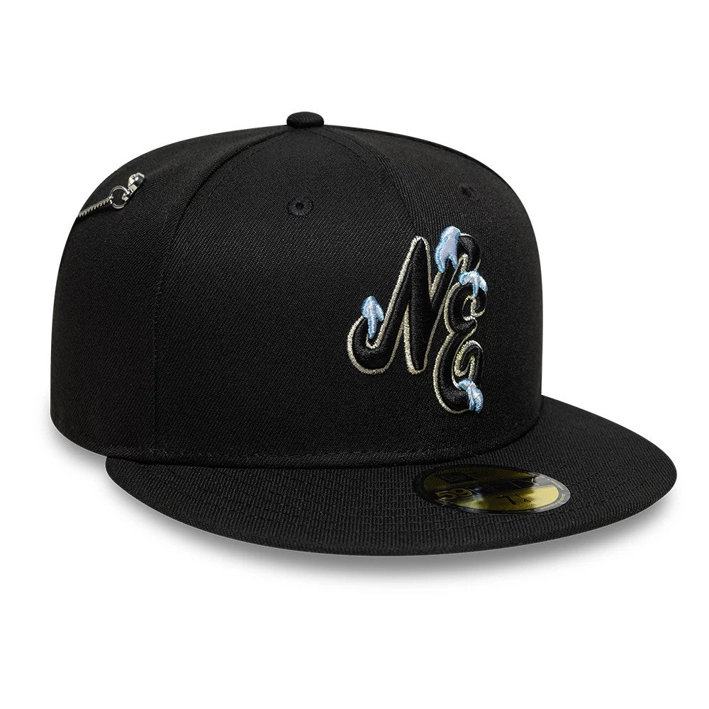 New Era Snow Icon Black 59FIFTY Fitted Cap, front view showing a black raised embroidery NE logo with blue snow accents on the front panel, a flat black visor, and a gold 59FIFTY size sticker.