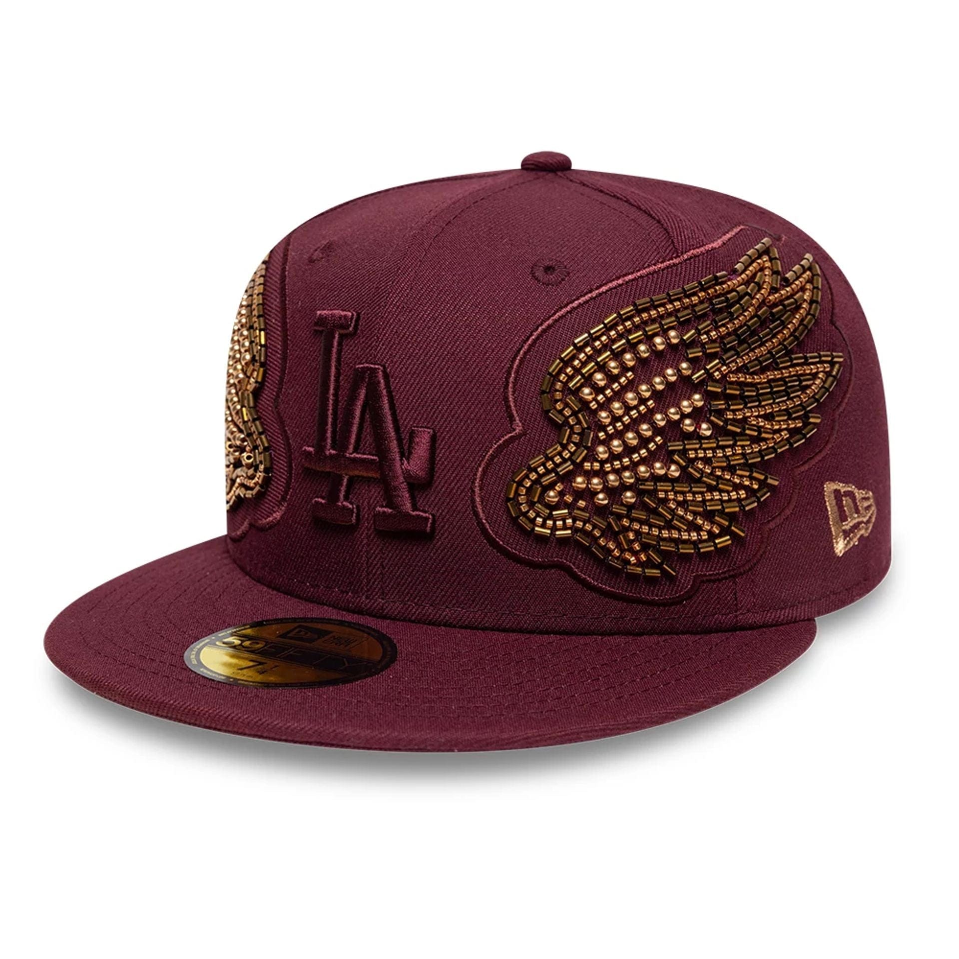 Pictured is this MLB Beaded Wings LA Dodgers 59FIFTY Fitted cap in dark red. 1
