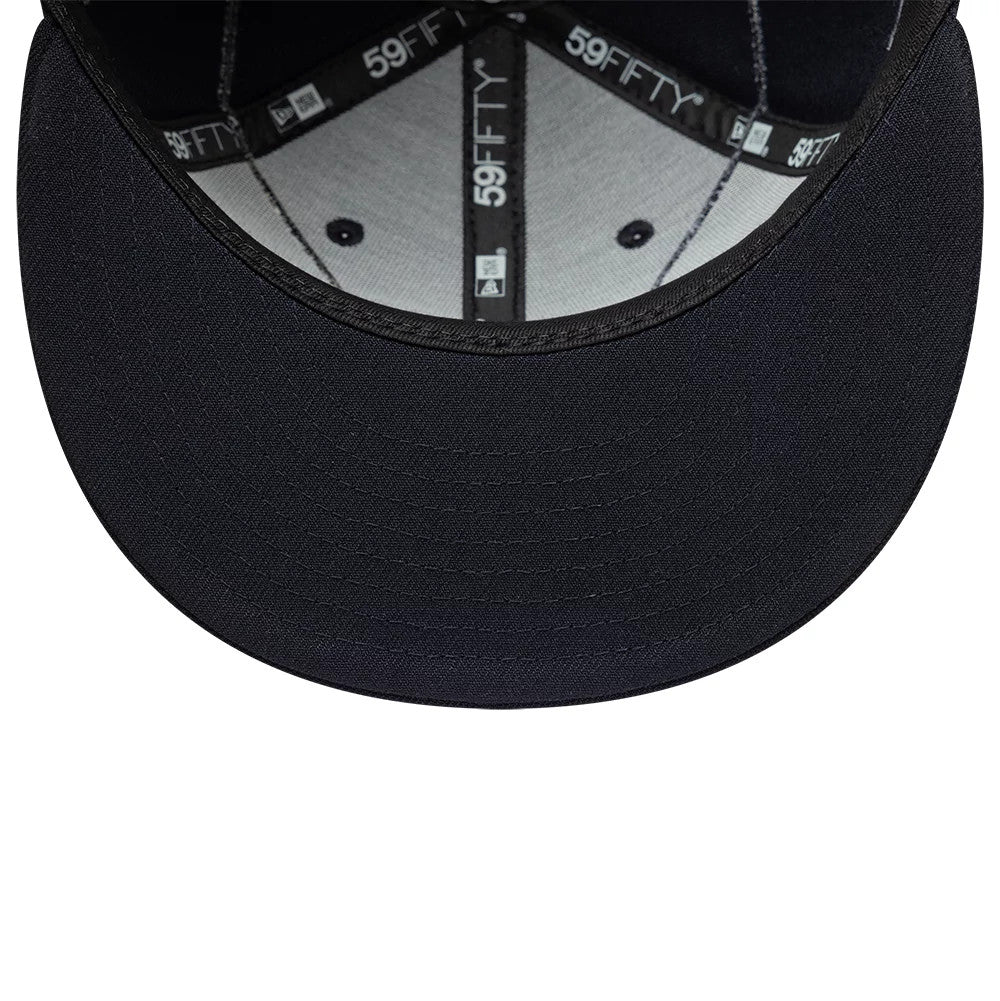 New Era Beaded Wings Navy 59FIFTY Fitted Cap, inside view showing black taping with white 59FIFTY branding, a grey sweatband, and a black undervisor featuring detailed stitch lines.