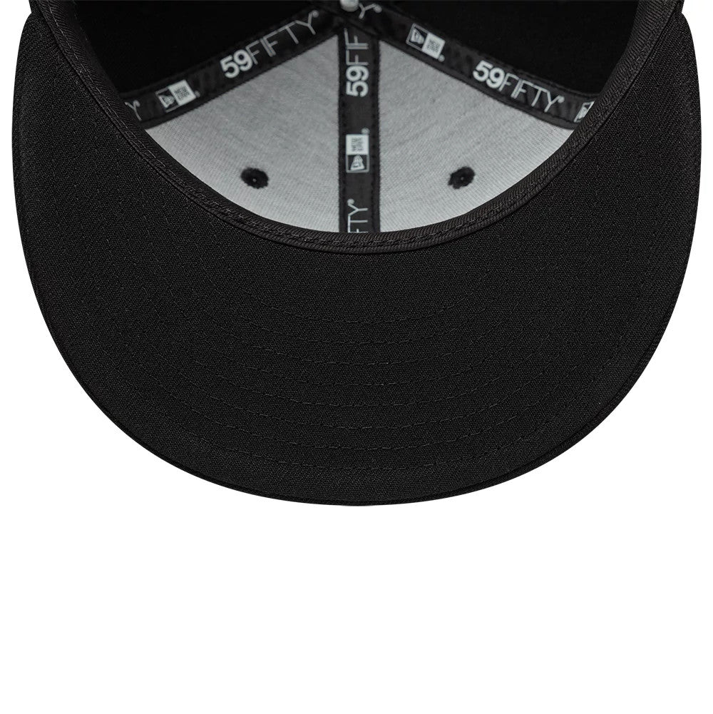New Era Gem Black 59FIFTY Fitted Cap, inside view showing black taping with the 59FIFTY logo, a grey sweatband, two black eyelets, and a plain black undervisor seamlessly connected to the visor.