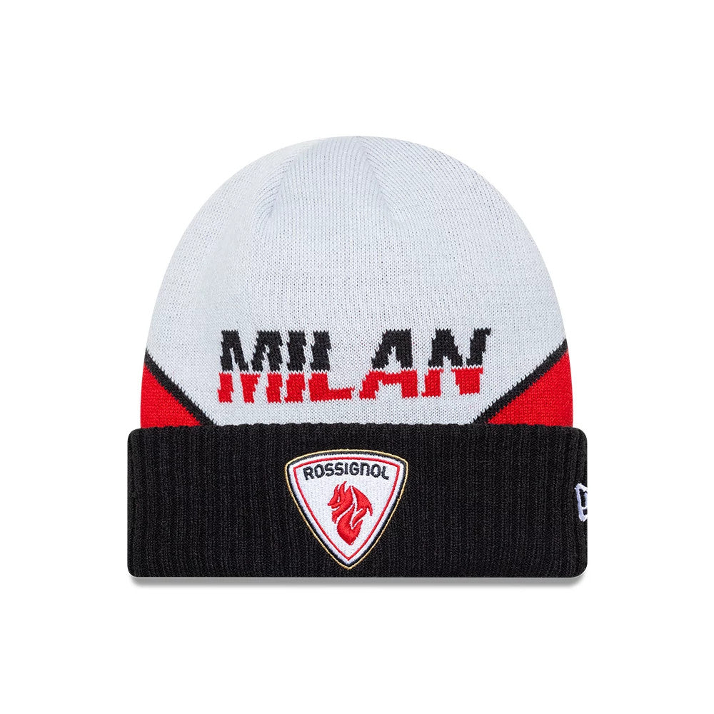 New Era Rossignol x AC Milan Black Cuff Knit Beanie Hat, front view showing MILAN lettering in black and red on a light grey background, with a Rossignol logo patch on the black ribbed cuff and New Era flag logo on the side.