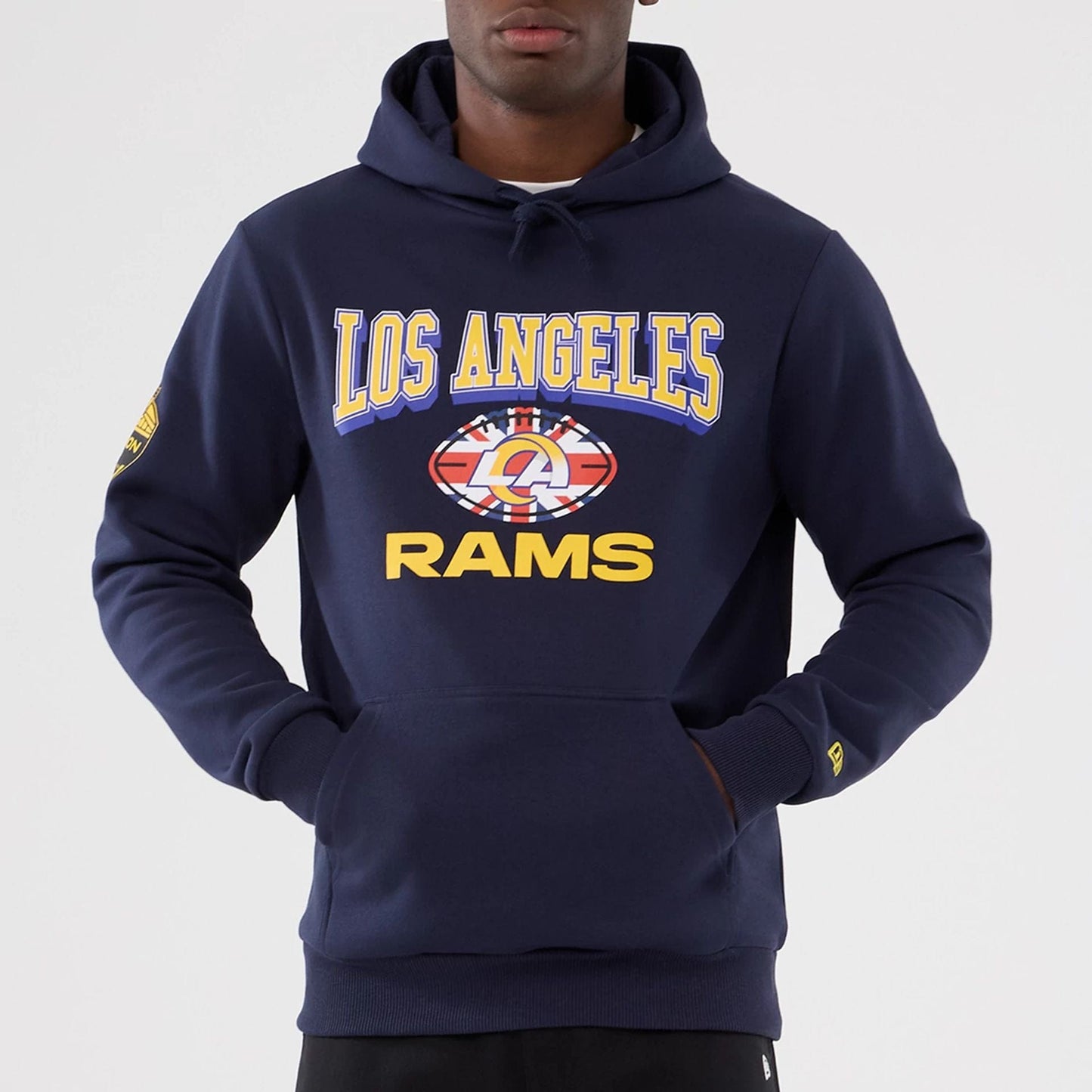The Male model is wearing LA Rams NFL International Series Games 2025 Navy Pullover Hoodie 7