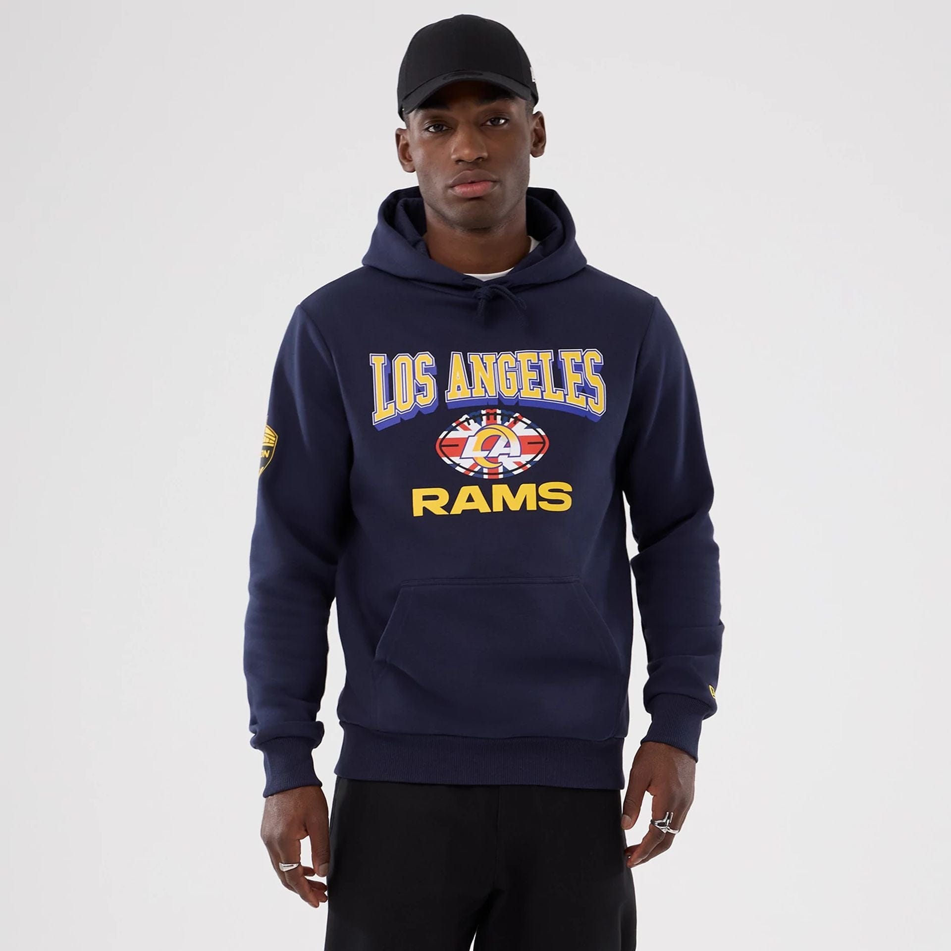 The Male model is wearing LA Rams NFL International Series Games 2025 Navy Pullover Hoodie 1
