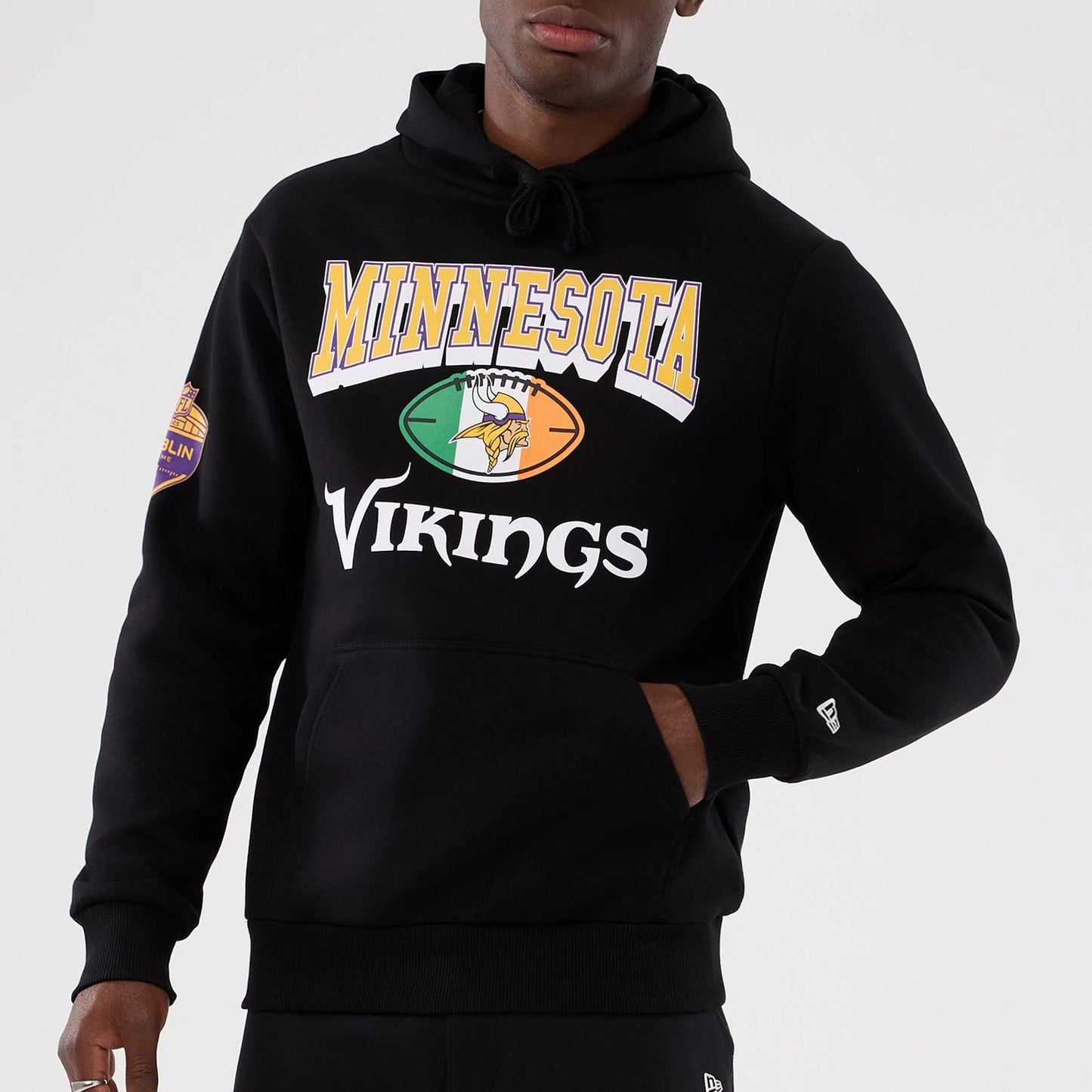 The Male model is wearing Minnesota Vikings NFL International Series Games 2025 Black Pullover Hoodie 7