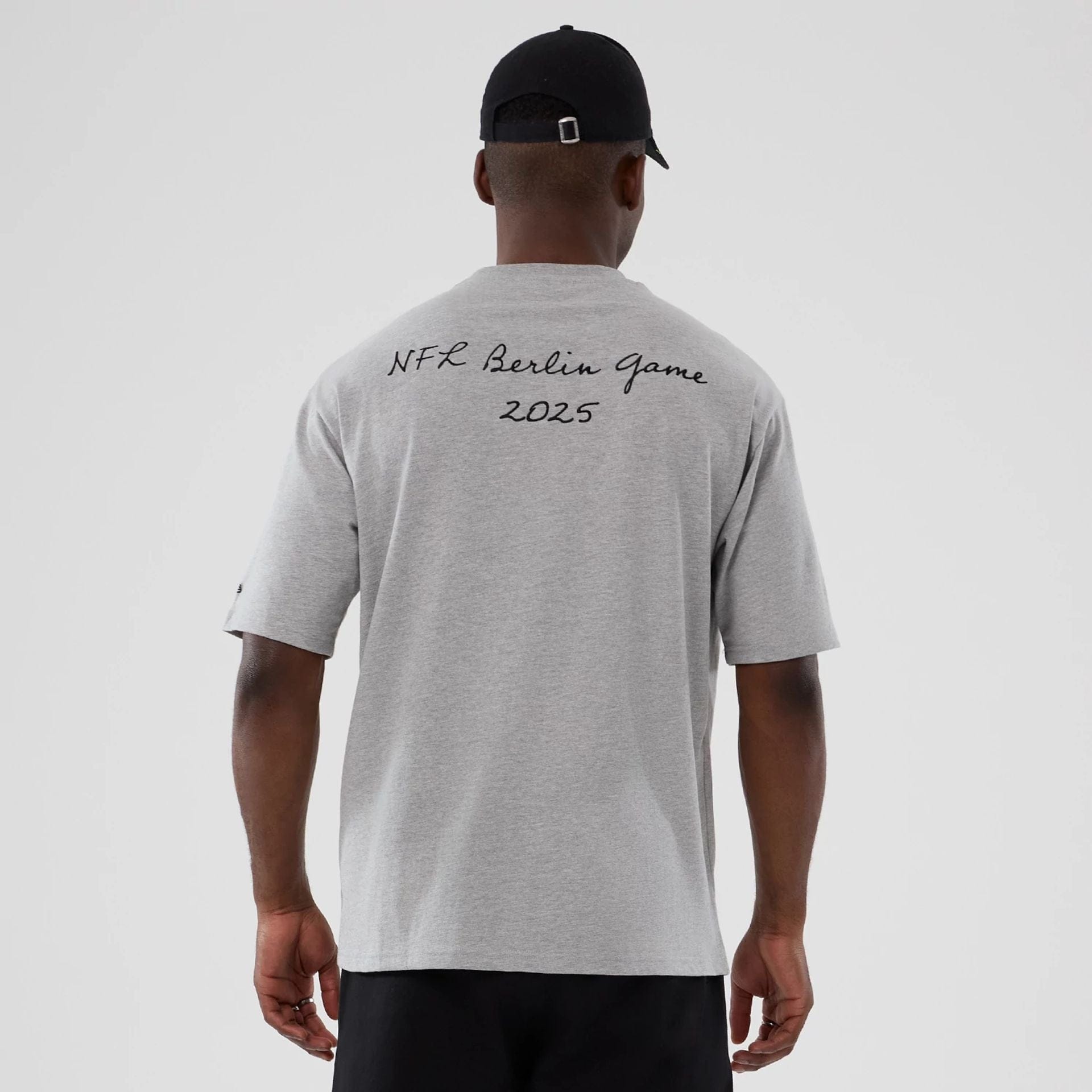 The Male model is wearing Atlanta Falcons NFL International Series Games 2025 Grey Premium T-Shirt 2