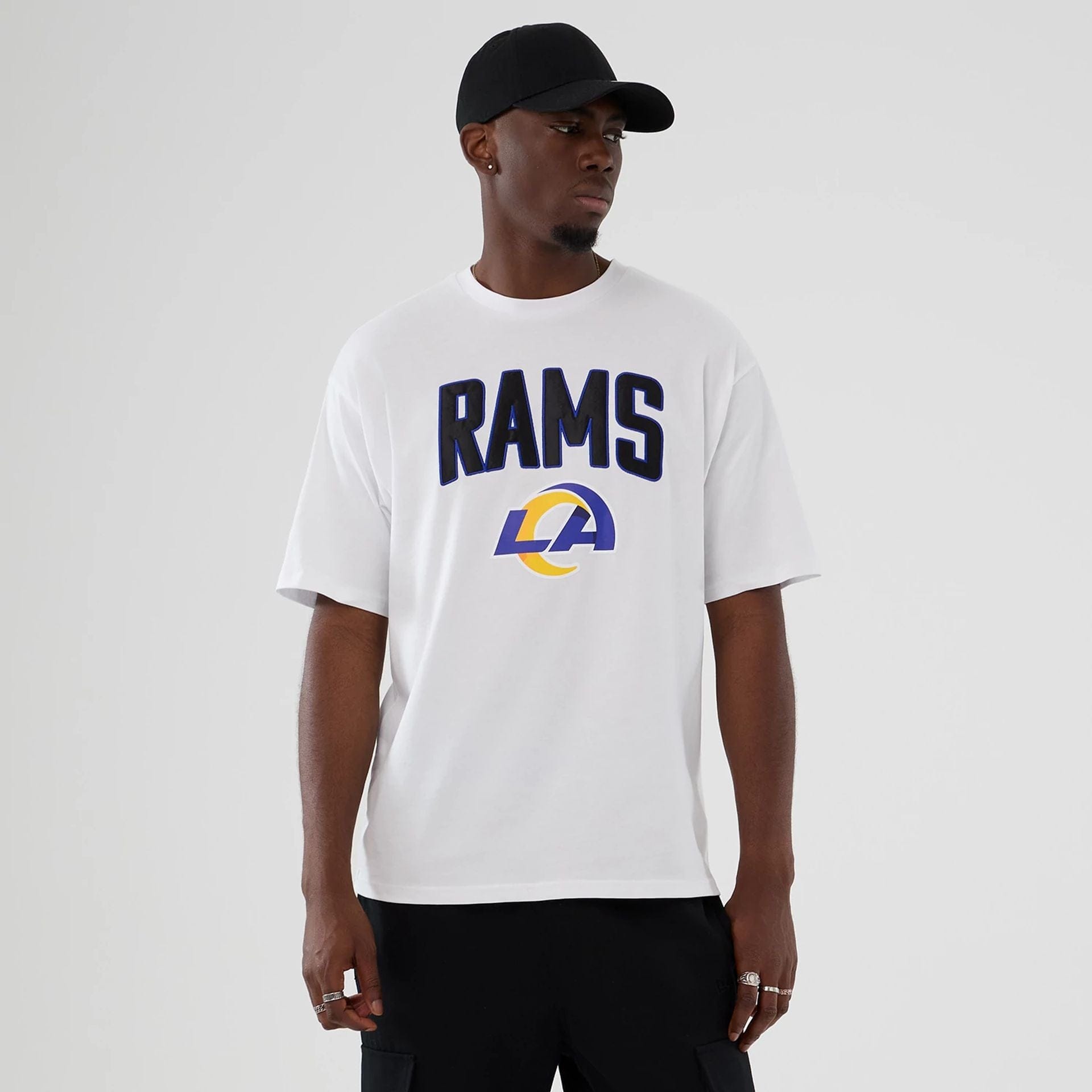 The Male model is wearing LA Rams NFL International Series Games 2025 White Premium T-Shirt 1