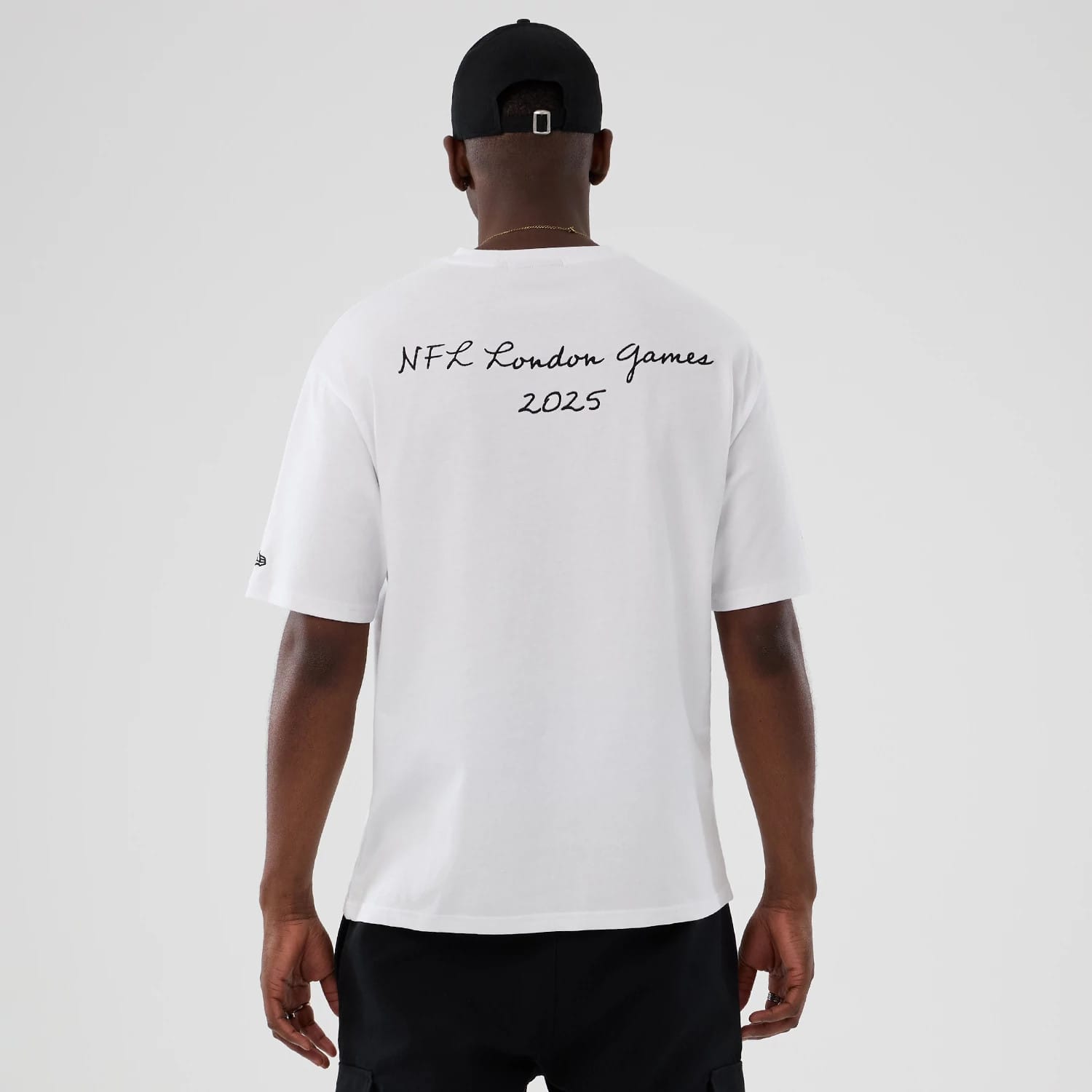 The Male model is wearing LA Rams NFL International Series Games 2025 White Premium T-Shirt 2