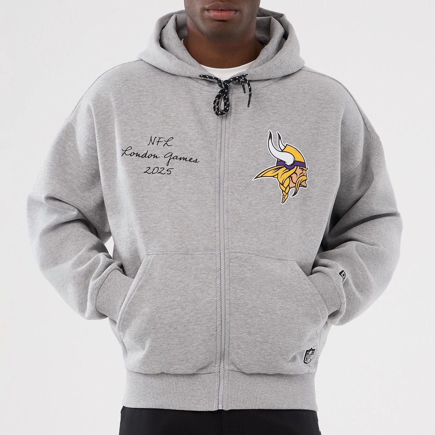The Male model is wearing Minnesota Vikings NFL International Series Games 2025 Grey Premium Pullover Hoodie 7