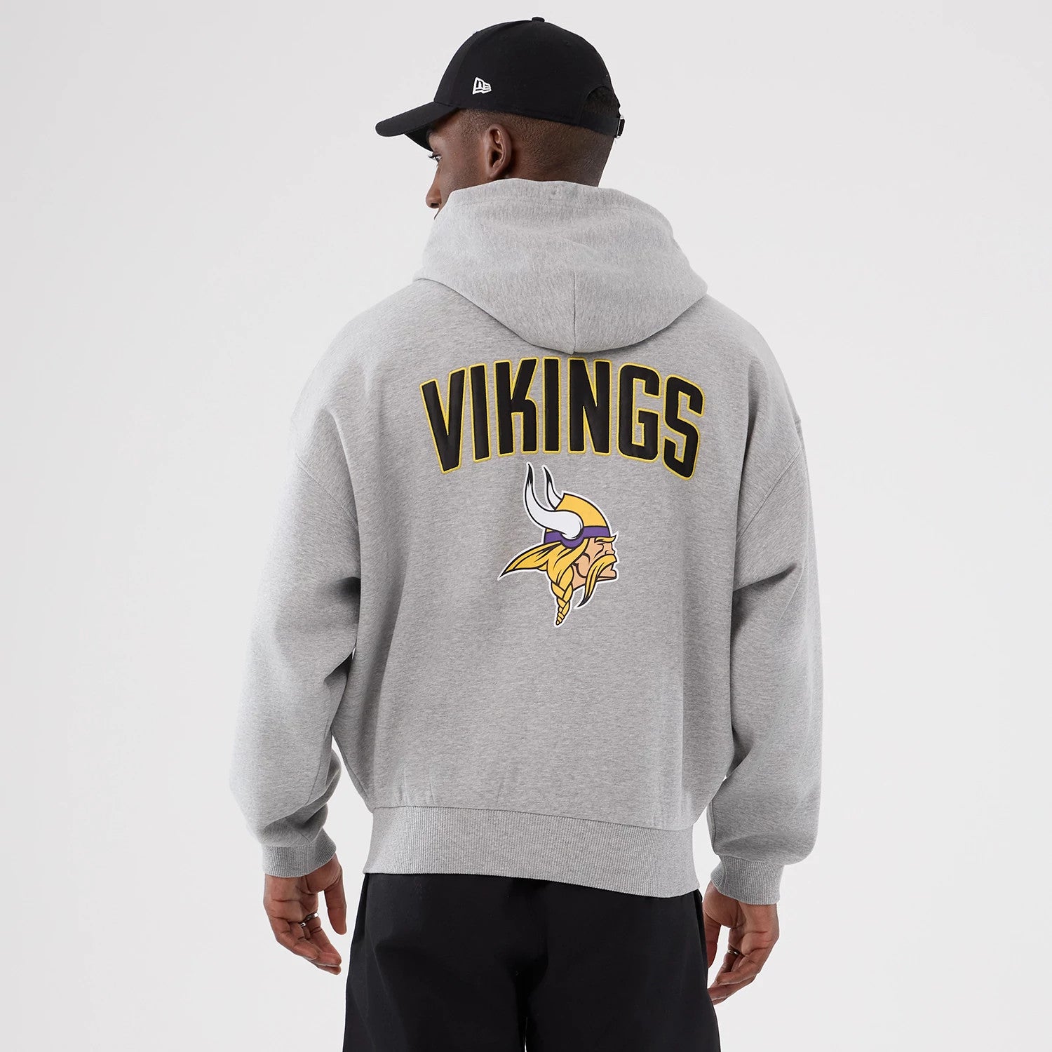 The Male model is wearing Minnesota Vikings NFL International Series Games 2025 Grey Premium Pullover Hoodie 2