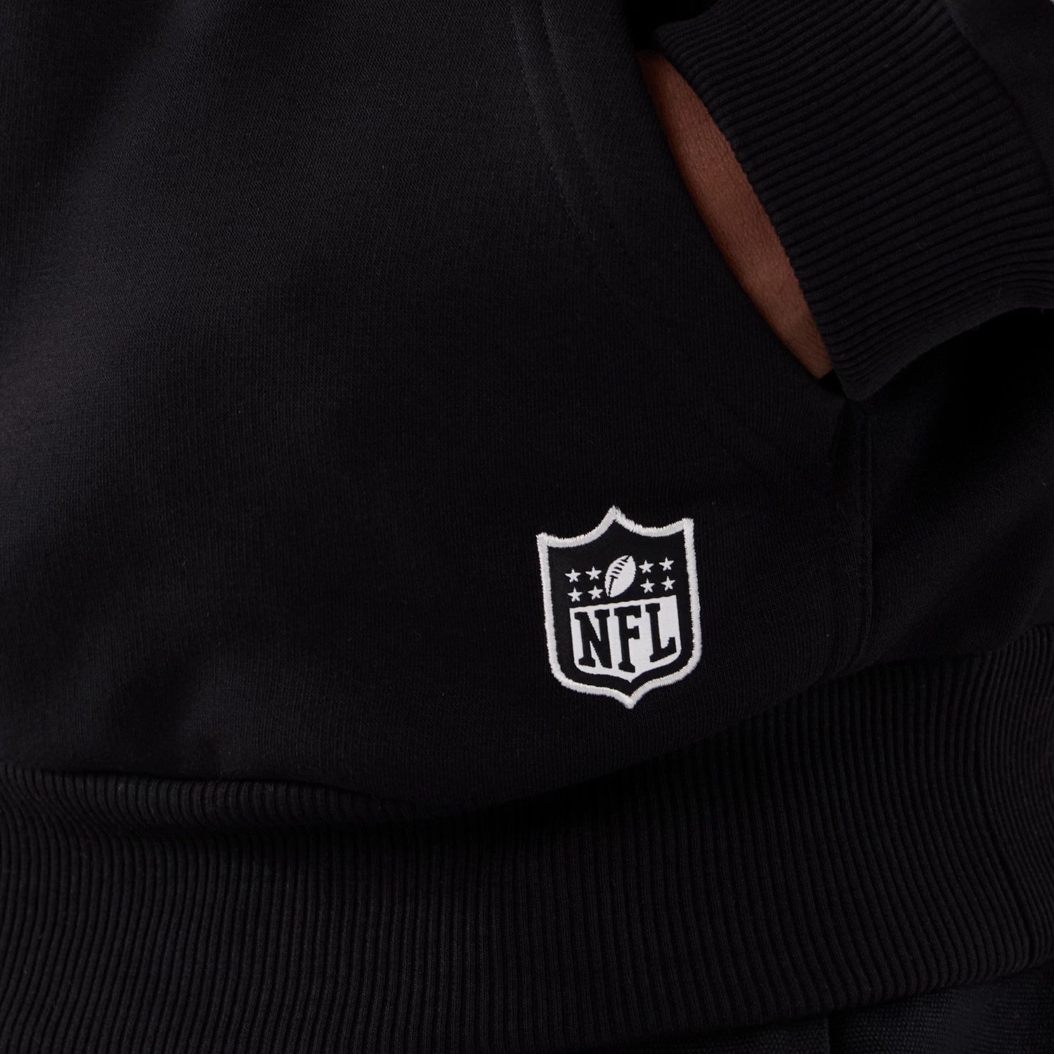The Male model is wearing Minnesota Vikings NFL International Series Games 2025 Black Premium Pullover Hoodie 4