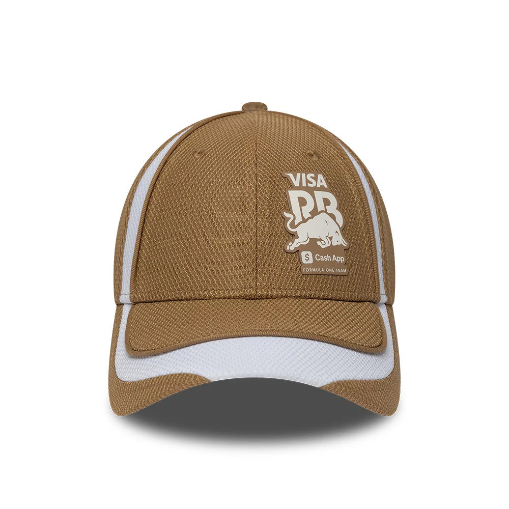 Visa Cash App Racing Bulls F1 Race Special Dark Beige New Era 9FORTY Adjustable Cap, front view showing the white embroidered Visa and bull logos on the front panel, with matching beige visor and white side panels.