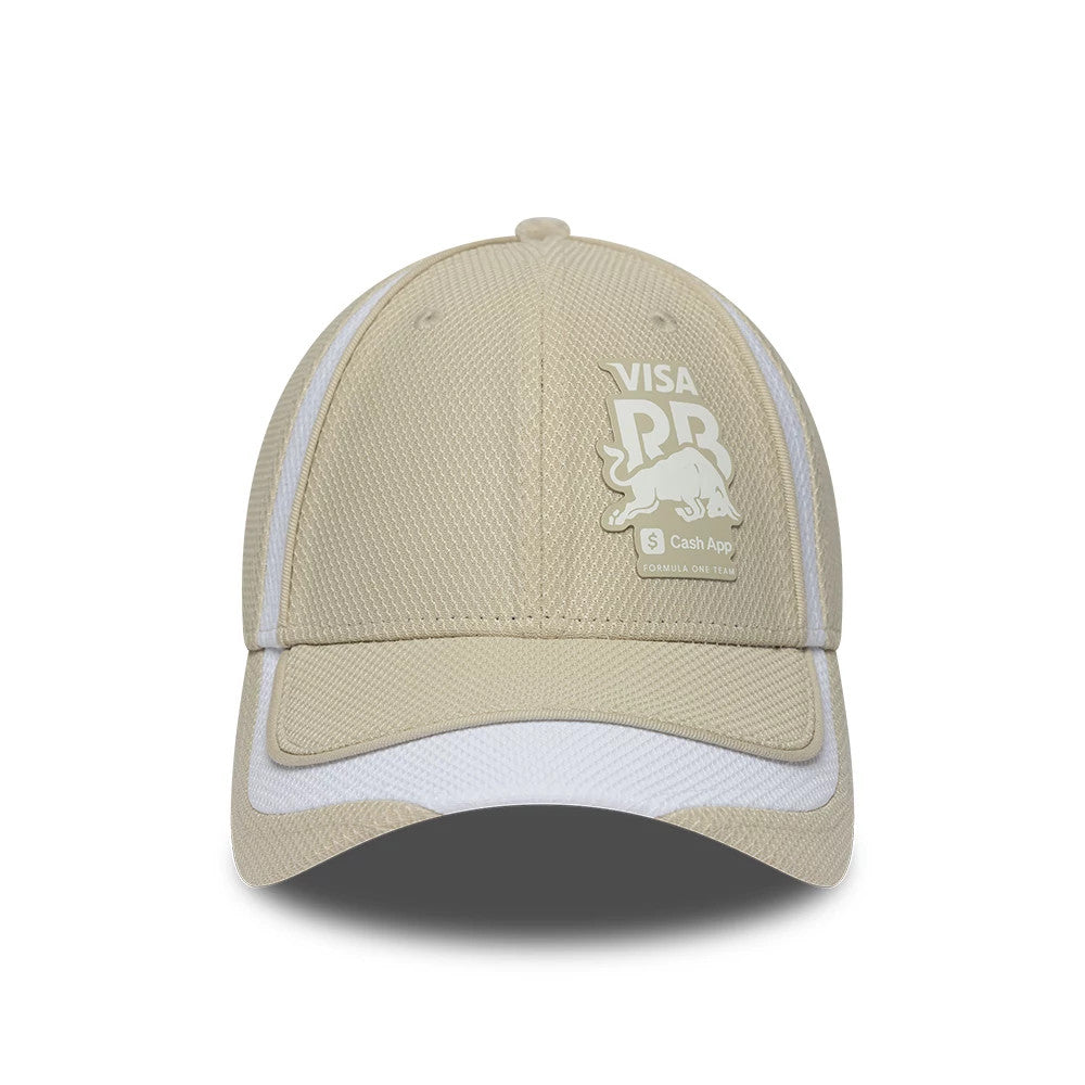Visa Cash App Racing Bulls F1 Race Special Beige New Era 9FORTY Adjustable Cap, front view showing the white Visa logos and running bull design embroidered on the structured beige crown with a curved beige visor.
