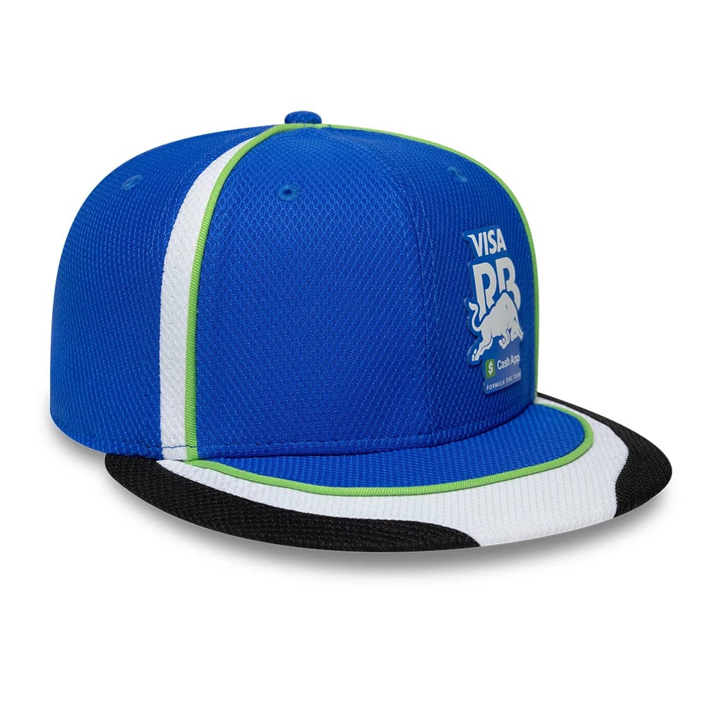 Visa Cash App Racing Bulls Team Bright Blue New Era 59FIFTY Fitted Cap, three-quarter view showing the white Visa and bull logo on the front panel, bright blue structured crown, and black visor with white and green trim.