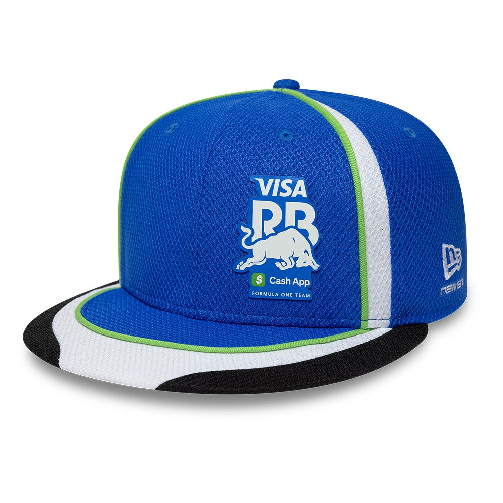 Visa Cash App Racing Bulls Team Bright Blue New Era 59FIFTY Fitted Cap, three-quarter view showing the white embroidered logo on the front panels, bright blue crown with green and white accents, and black and white visor.