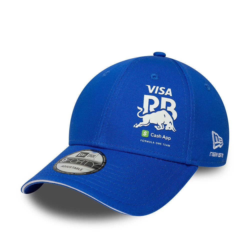Visa Cash App Racing Bulls Essential Bright Blue New Era 9FORTY Adjustable Cap, three-quarter view showing the white Visa, RB, and bull graphics with Cash App branding on front, black 9FORTY size sticker on visor.