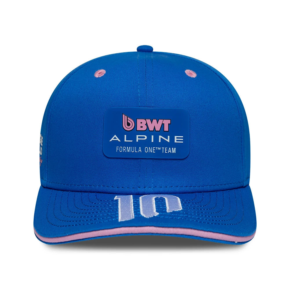 Alpine Racing Pierre Gasly Blue New Era 9SEVENTY Stretch Snap Adjustable Cap, front view showing a raised BWT Alpine Formula One Team graphic on the structured blue crown, with pink and white details, and number 10 embroidered on the visor.