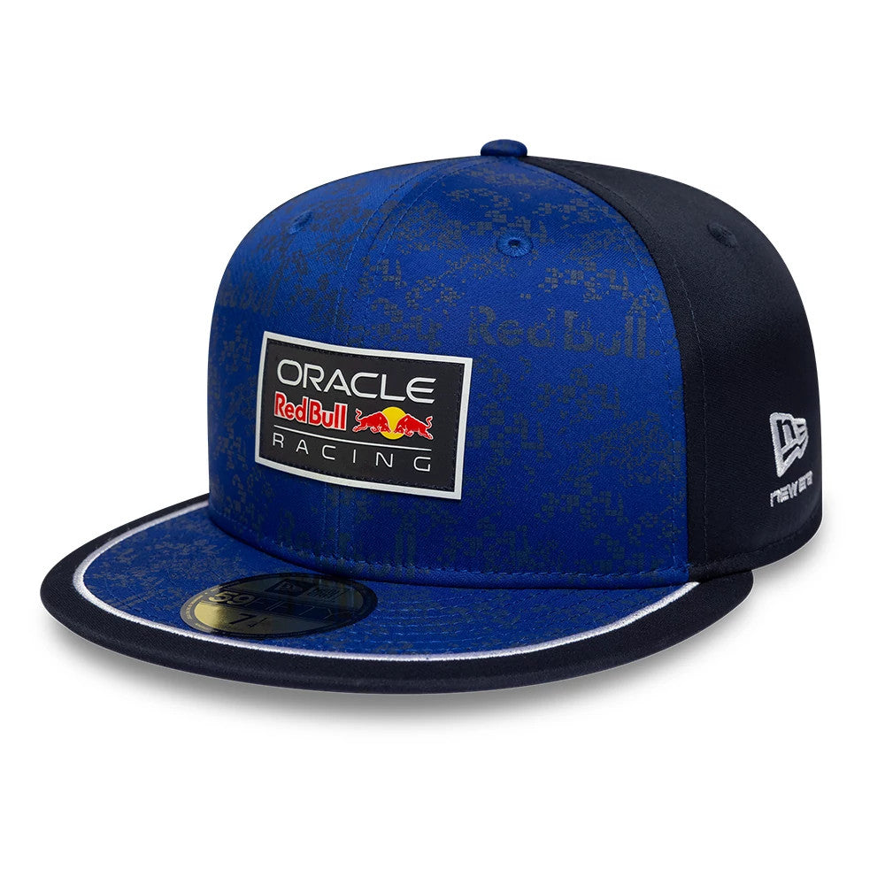 Red Bull Racing Dark Blue New Era 59FIFTY Fitted Cap, three-quarter view showing the embroidered Oracle Red Bull Racing logo on the front panel, with a dark blue visor featuring a gold 59FIFTY size sticker and contrast piping.