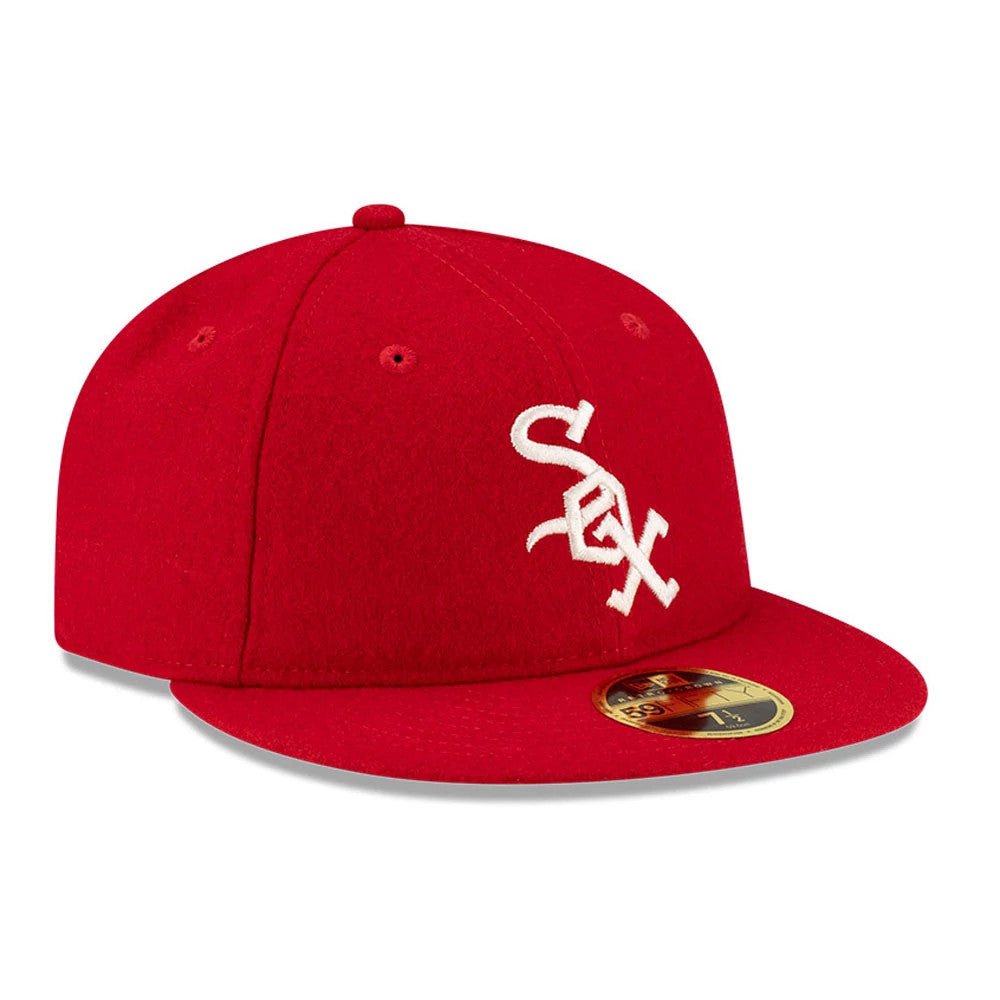 Chicago White Sox FOG X MLB Red Retro Crown New Era 59FIFTY Fitted Cap, three-quarter view showing the white embroidered Sox logo on the structured red crown, with a matching red visor and a gold 59FIFTY size sticker.